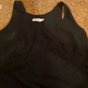 Black silky pocket tank